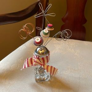 Whimsical vintage crystal salt shaker and vintage button arrangement